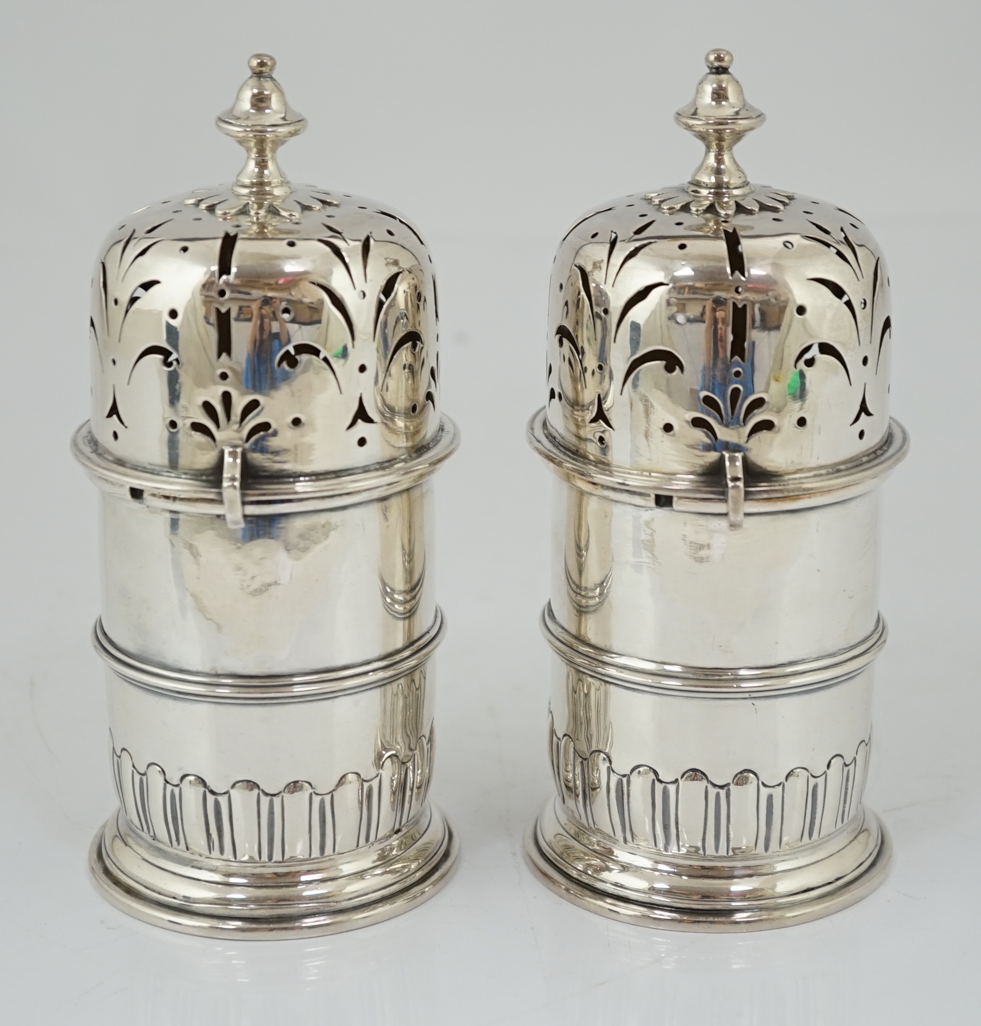 A good pair of late George I silver lighthouse casters, by William Spackman